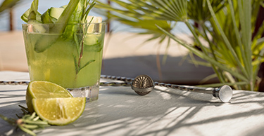 A refreshing citrus cocktail sits waiting to be enjoyed at one of the bars at D Maris Bay resort.